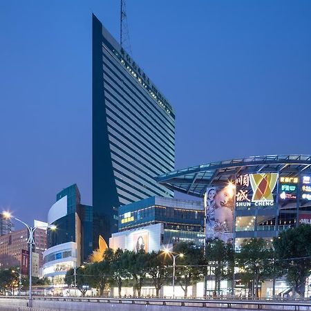 New Era Hotel Kunming Esterno foto