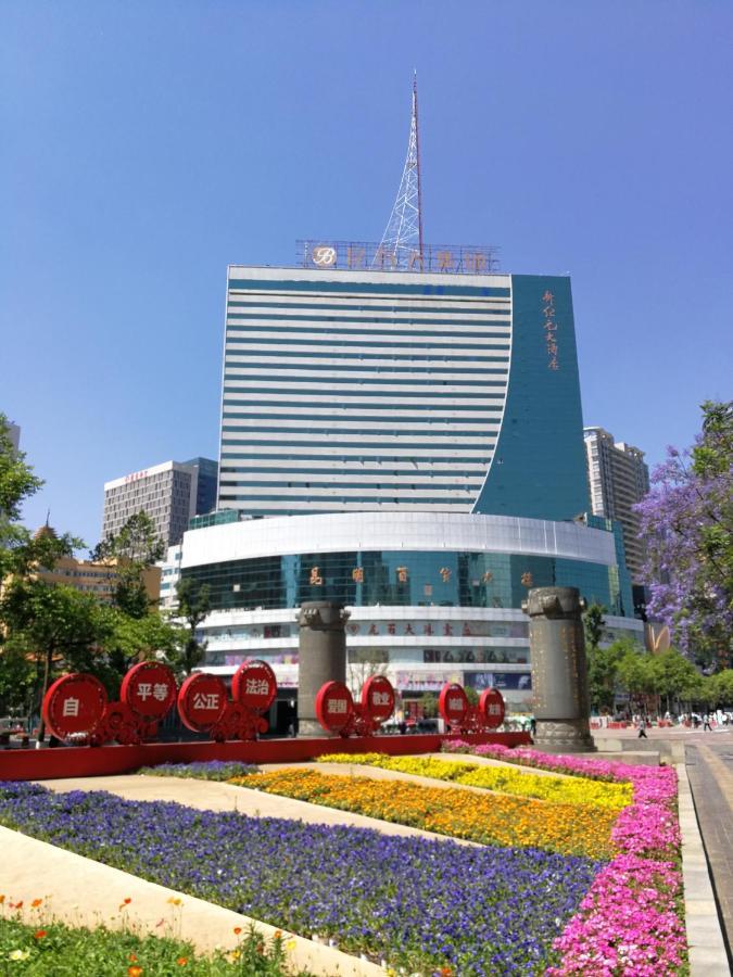 New Era Hotel Kunming Esterno foto