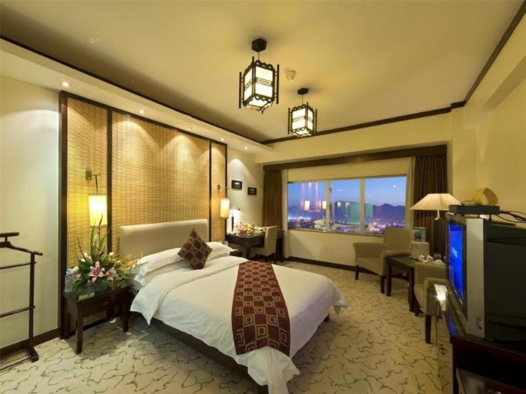 New Era Hotel Kunming Esterno foto