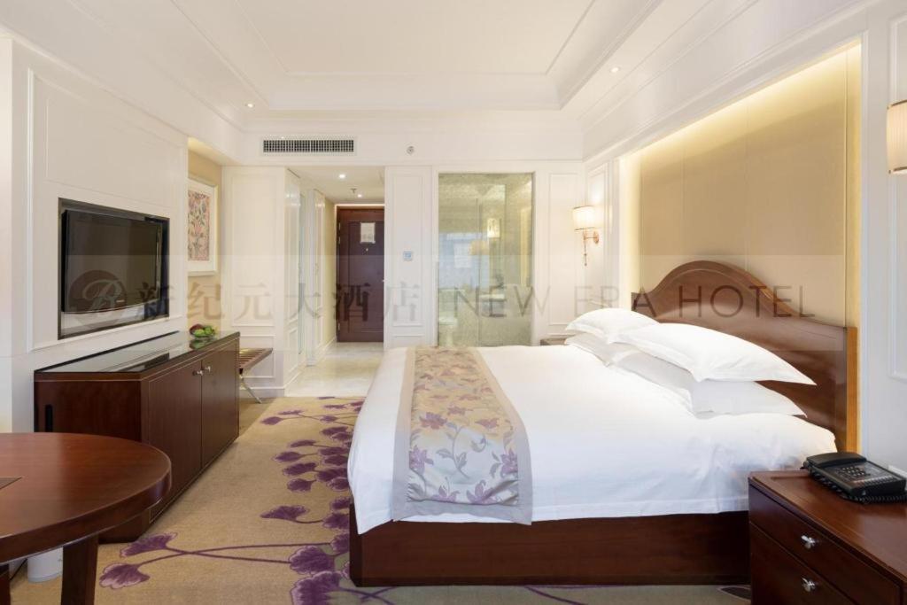 New Era Hotel Kunming Esterno foto