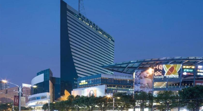 New Era Hotel Kunming Esterno foto