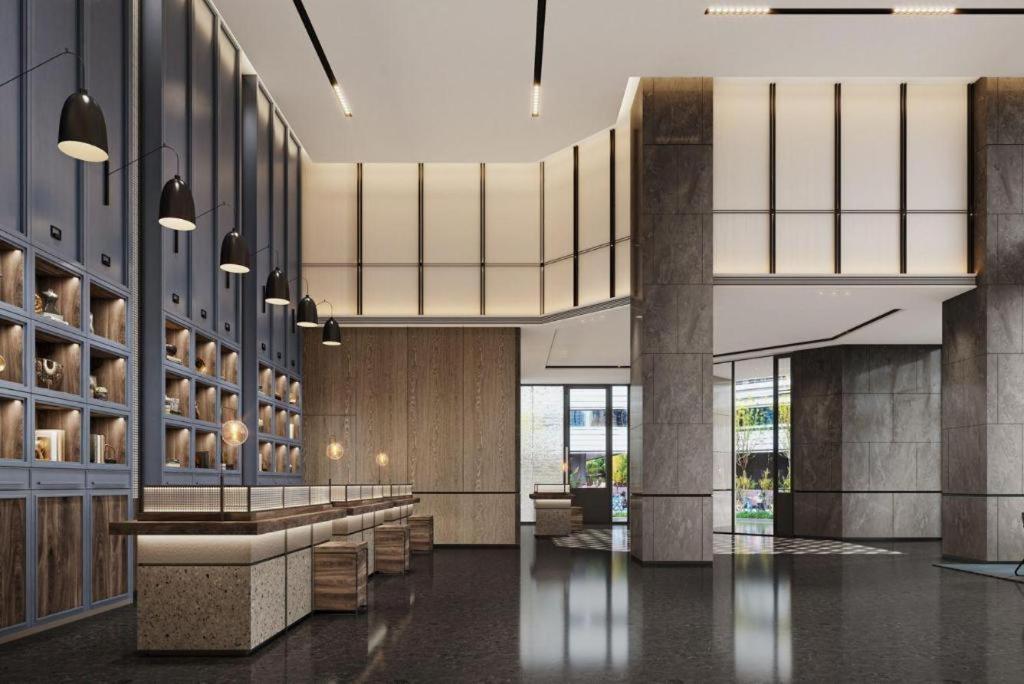 New Era Hotel Kunming Esterno foto