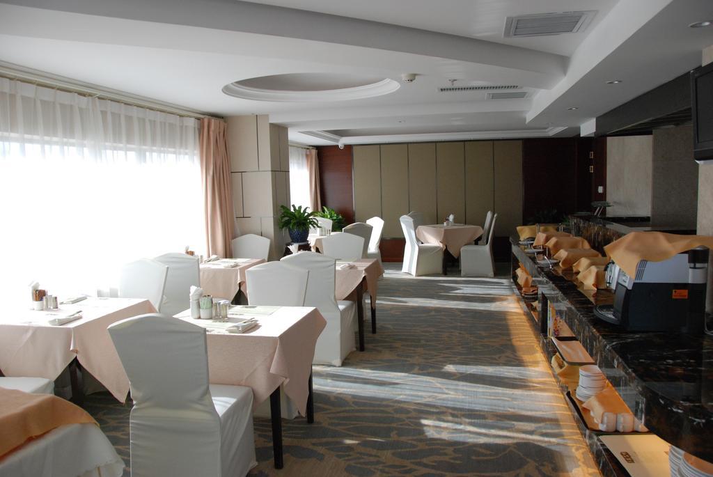 New Era Hotel Kunming Esterno foto