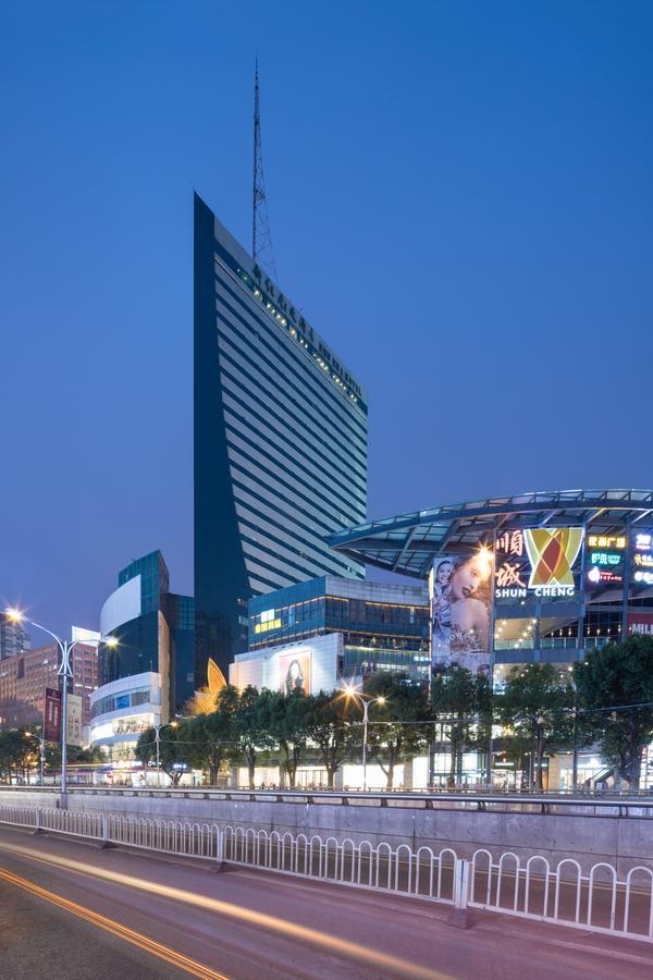 New Era Hotel Kunming Esterno foto