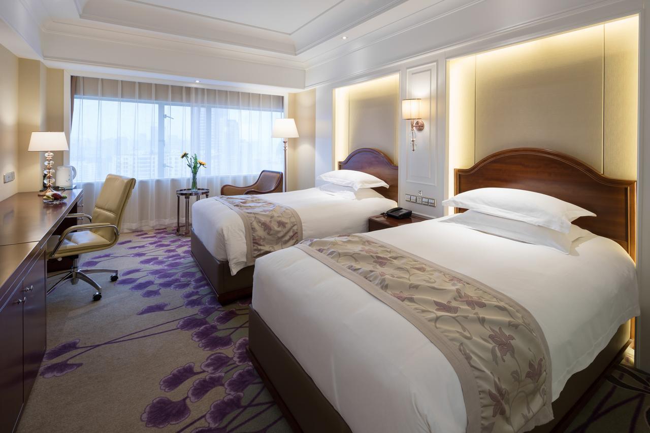 New Era Hotel Kunming Esterno foto