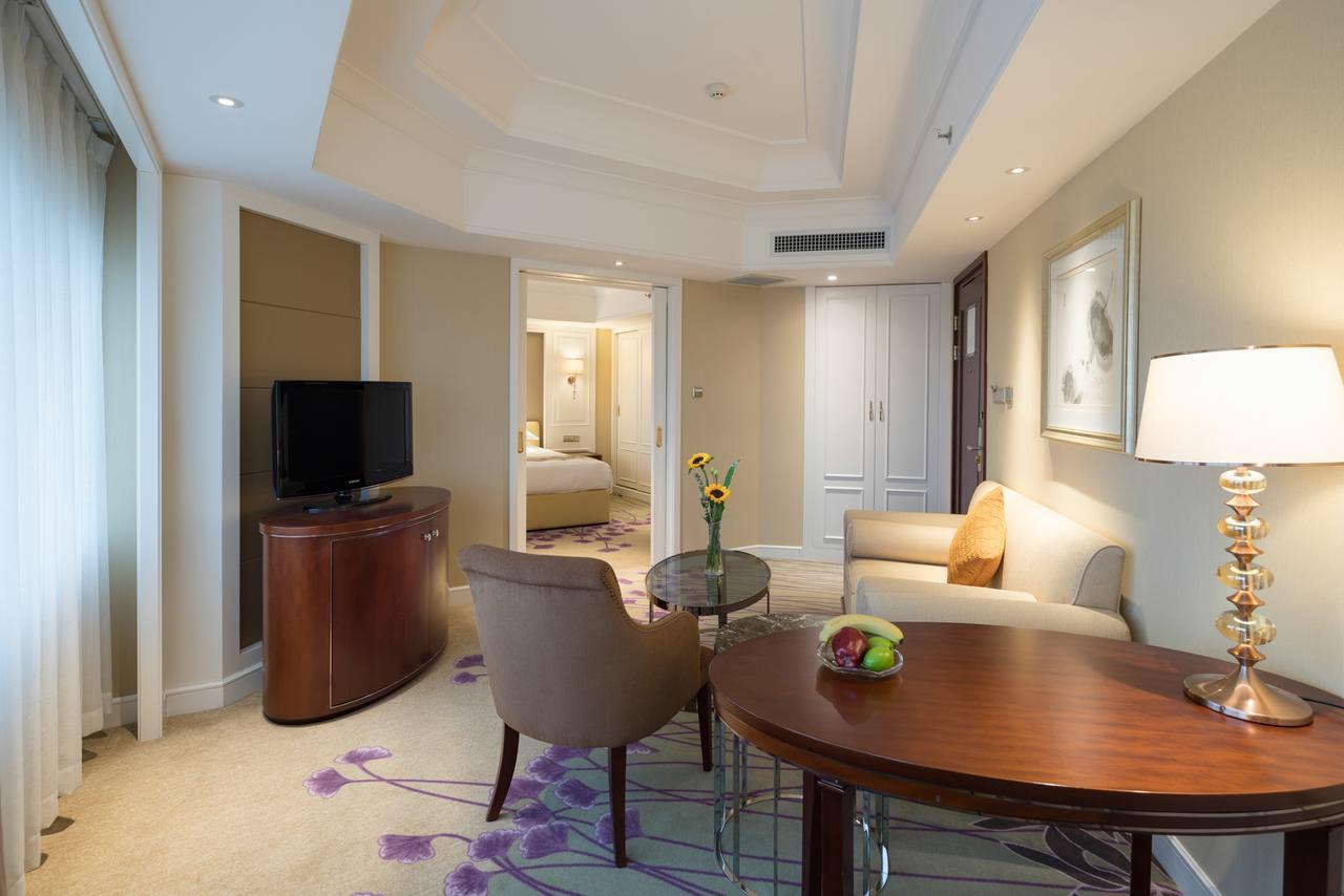 New Era Hotel Kunming Esterno foto